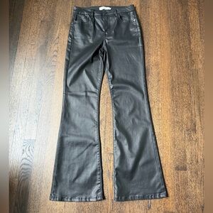 Hidden coated denim. Slight flare leg.